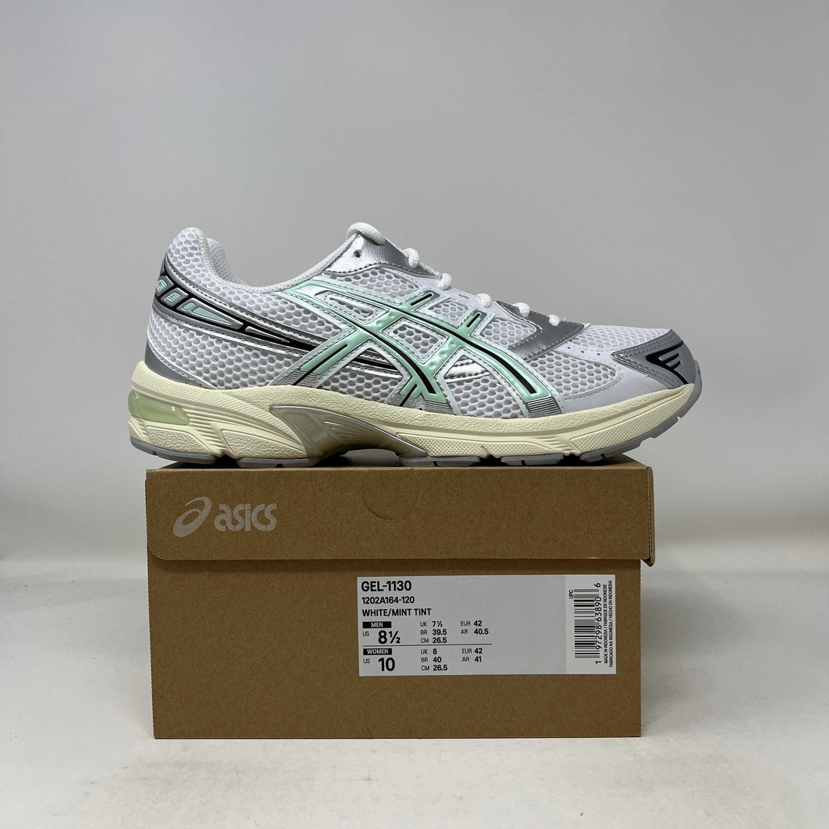 ASICS Gel-1130 White Mint Tint sneaker with white mesh, mint-green overlays, silver accents and a cream sole.
