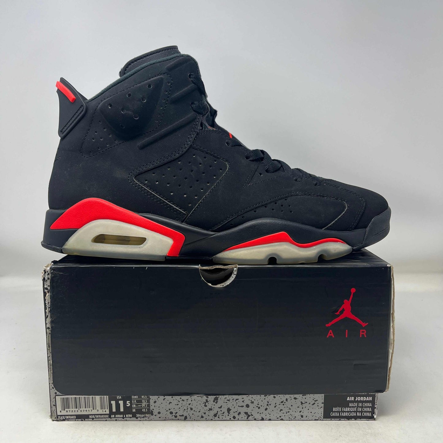 Used Jordan 6 Retro Black Infrared basketball shoe on original box, size 11.5