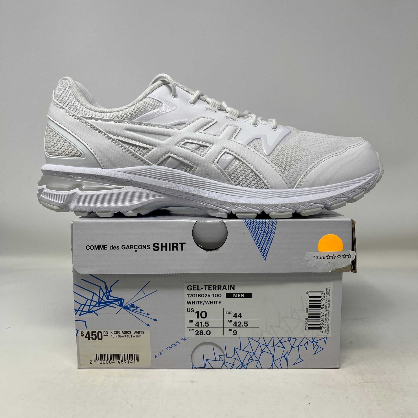 White Asics Mens Gel-Terrain X sneaker on Comme des Garcons SHIRT box