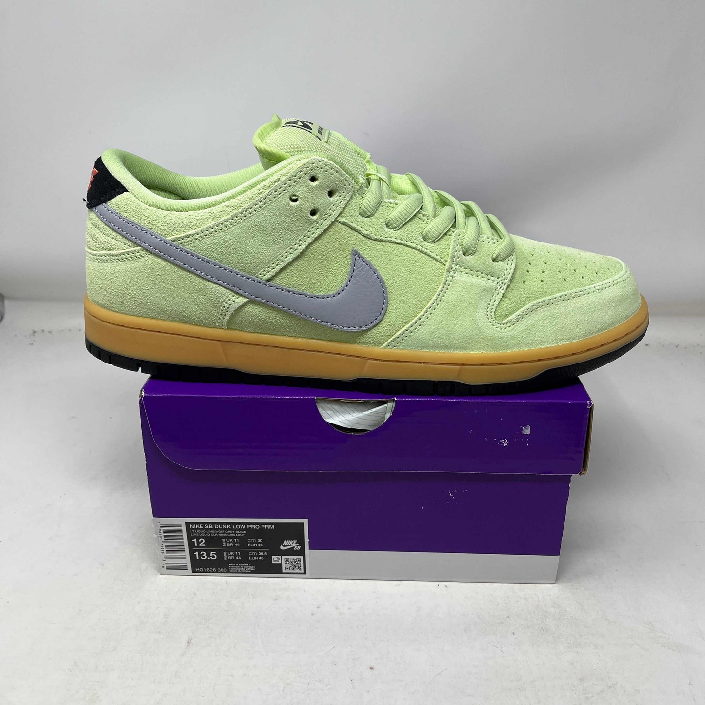 Nike SB Dunk Low Verdugo Mountain sneaker in white leather with green suede and black accents
