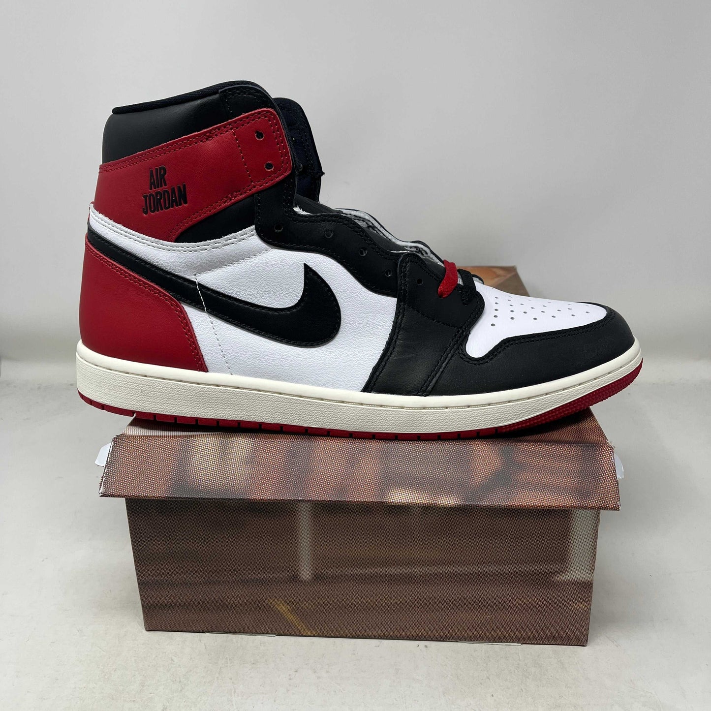 Jordan 1 Retro High OG Black Toe Reimagined premium leather sneakers new in sizes 10.5-13
