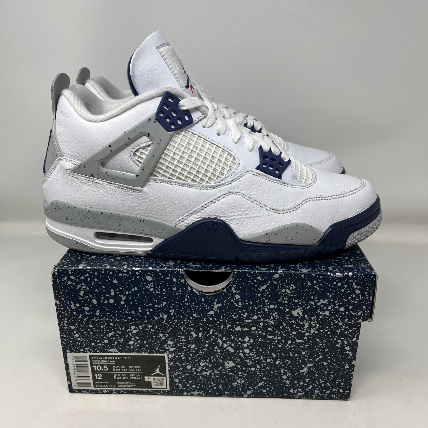 Used Jordan 4 Retro Midnight Navy sneakers on original box