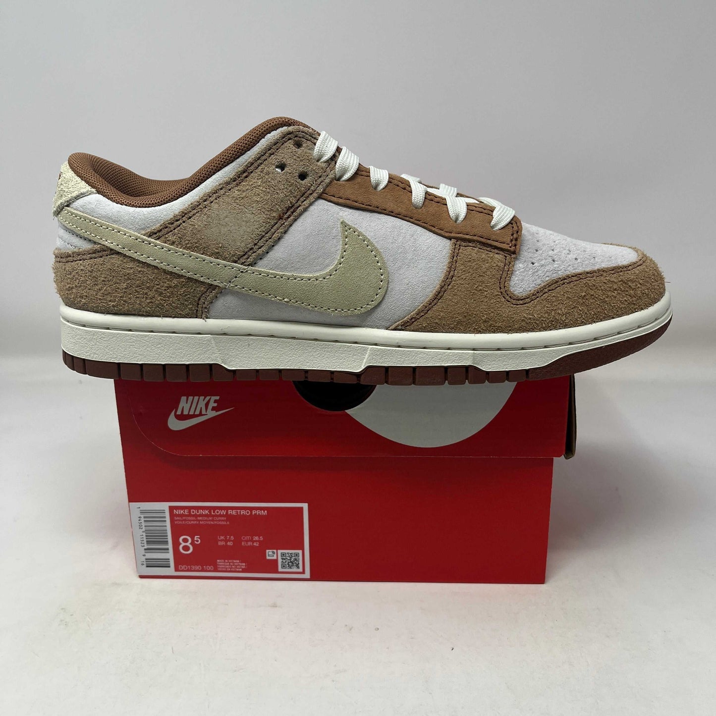 Nike Dunk Low Medium Curry sneaker in brown and beige on red Nike box with multiple sizes available