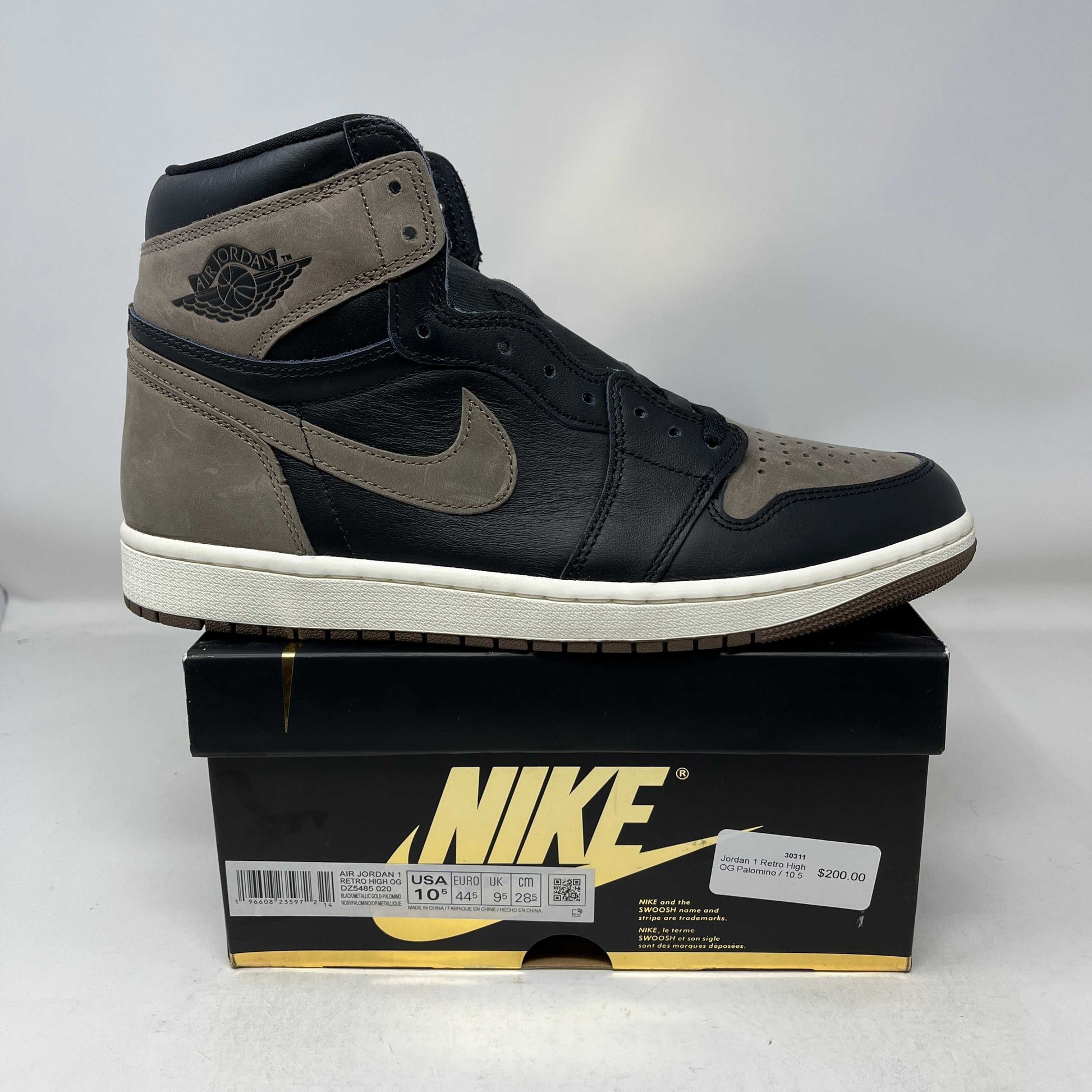 Jordan 1 Retro High OG Palomino sneaker in black and brown on Nike box in multiple sizes