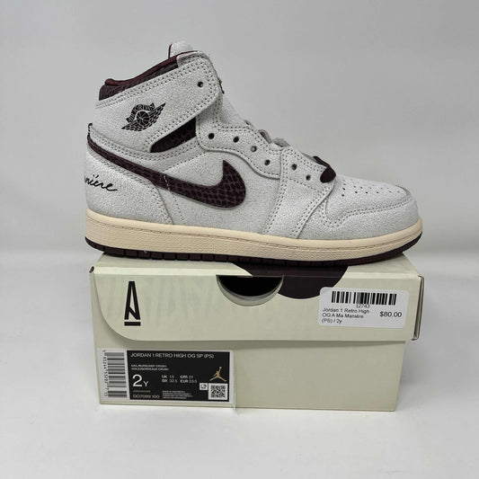 Jordan 1 Retro High OG A Ma Maniére PS white and dark brown sneaker on box