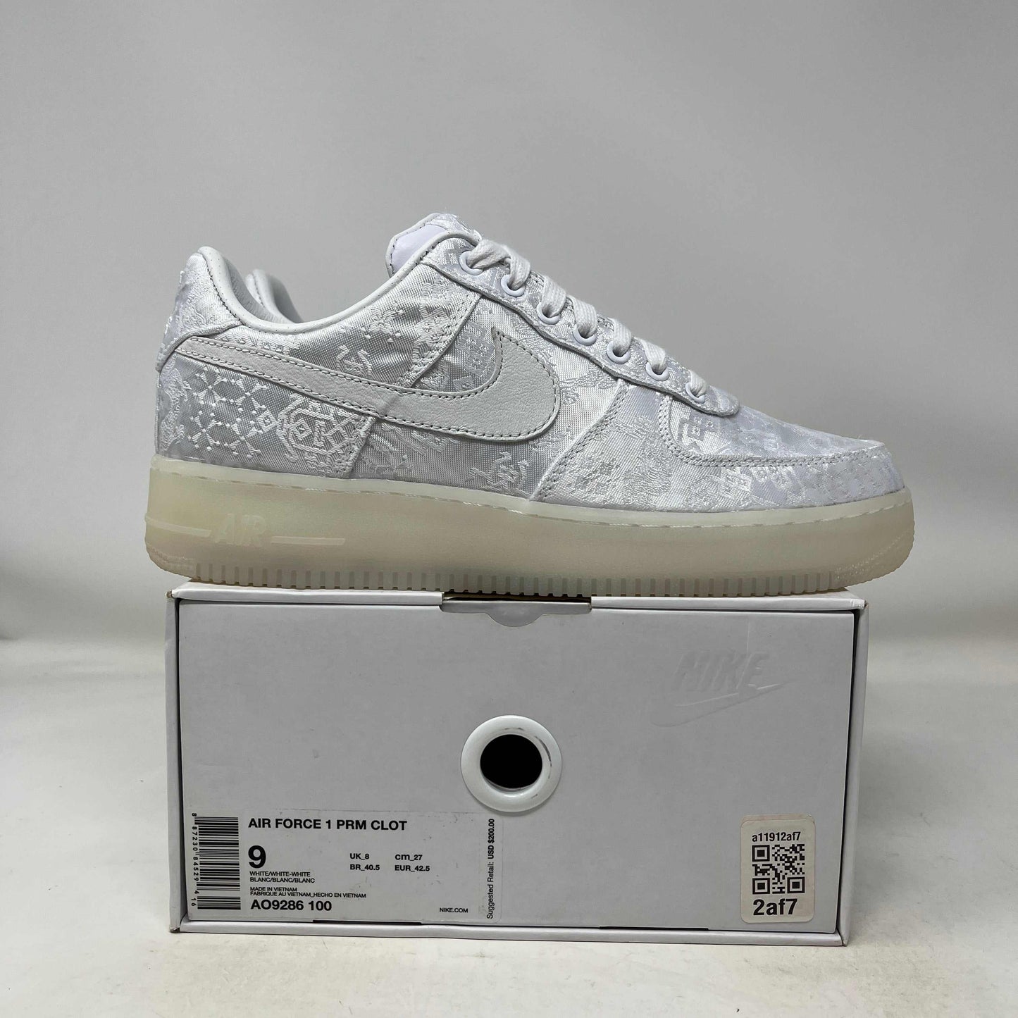 Nike Air Force 1 Low CLOT 1WORLD 2018 used sneaker in white on shoebox