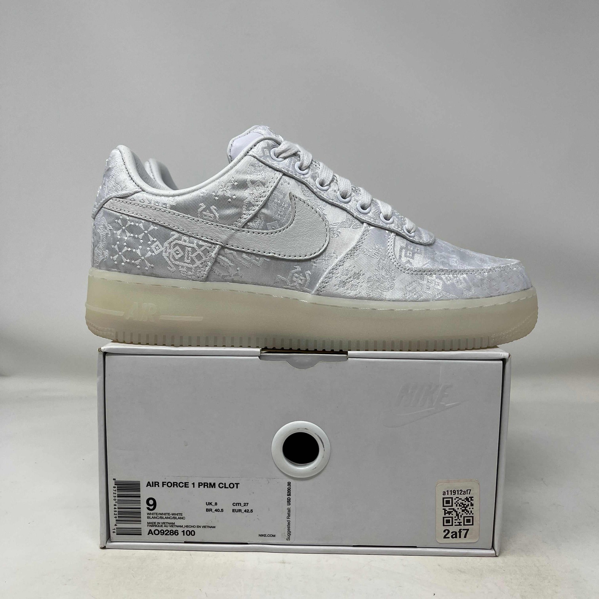 Nike Air Force 1 Low CLOT 1WORLD 2018 used sneaker in white on shoebox