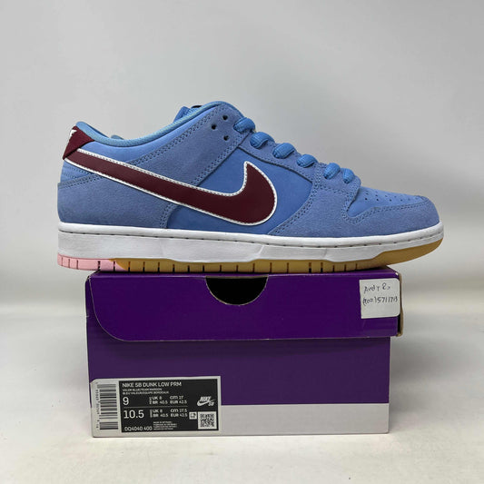 Used Nike SB Dunk Low Philadelphia Phillies sneaker in blue with maroon swoosh on purple Nike box