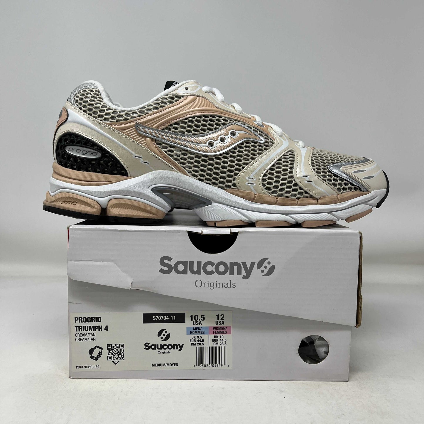 Saucony ProGrid Triumph 4 cream tan used running shoe on original box