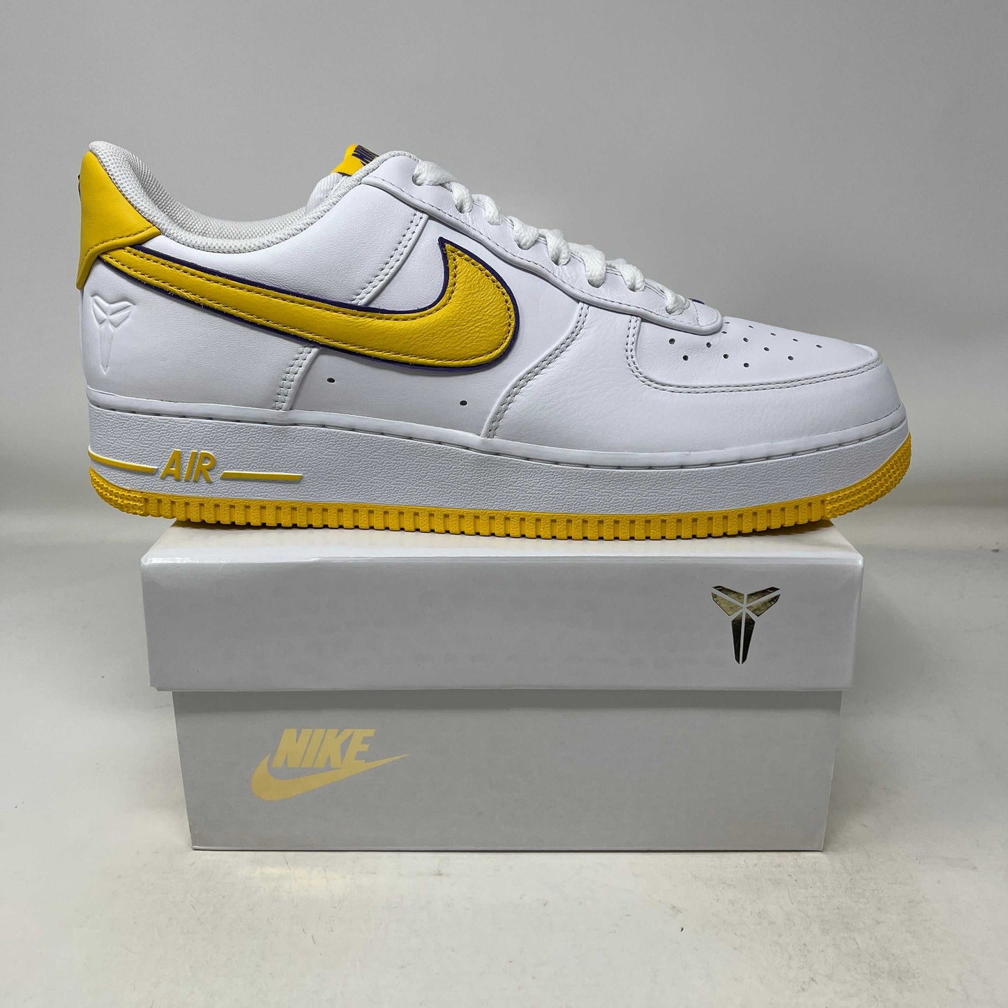 Nike Air Force 1 Low Retro QS Kobe Bryant Lakers Home white and yellow sneaker on box