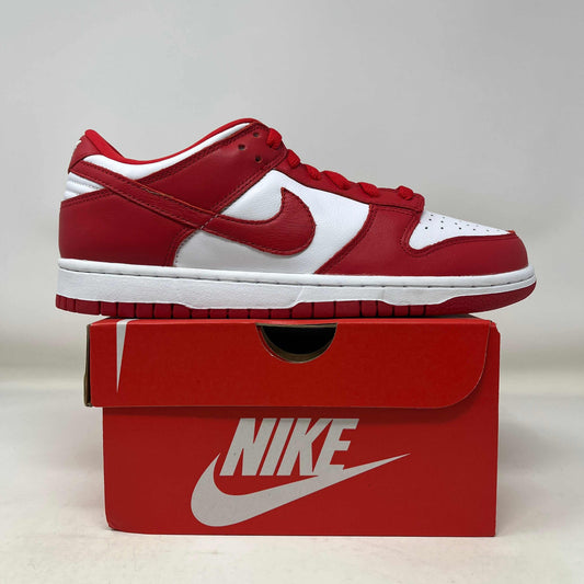 Nike Dunk Low SP St. John's sneaker in red and white on a red Nike shoe box