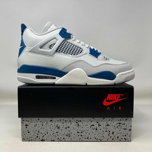 White and military blue Jordan 4 Retro sneaker on black Nike Air box with speckled gray base