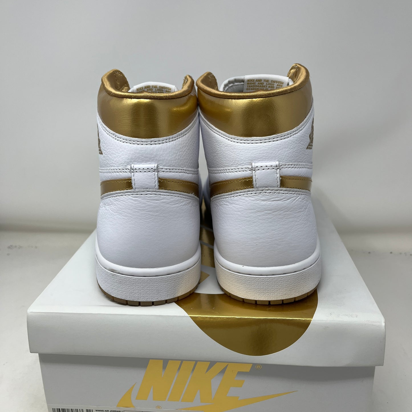Jordan 1 Retro High OG Metallic Gold (Women's) Used