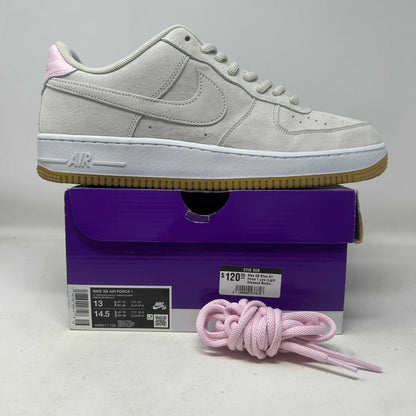 Nike Air Force 1 Low SB Light Orewood Brown Pink sneaker with pale grey suede, stitched Swoosh, pink heel tab and laces.