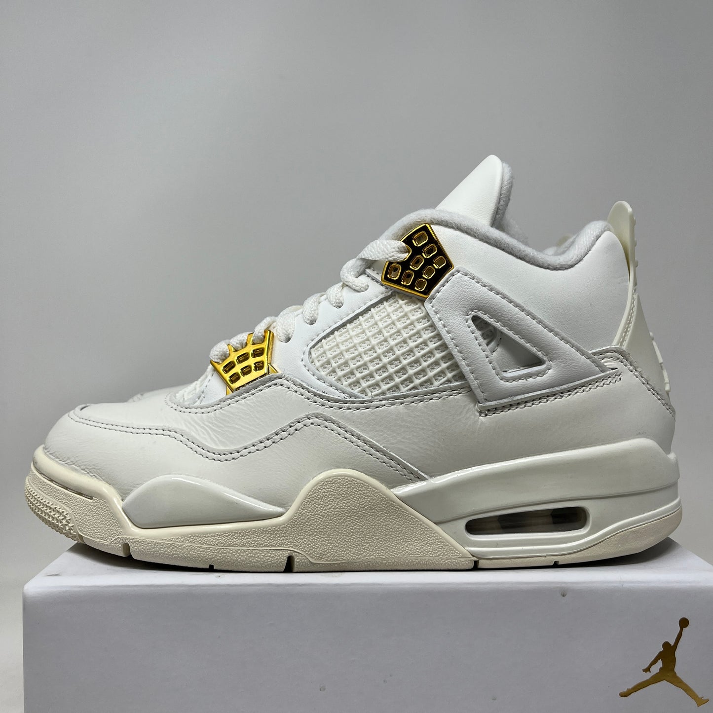 Jordan 4 Retro Metallic Gold (Women's) Used