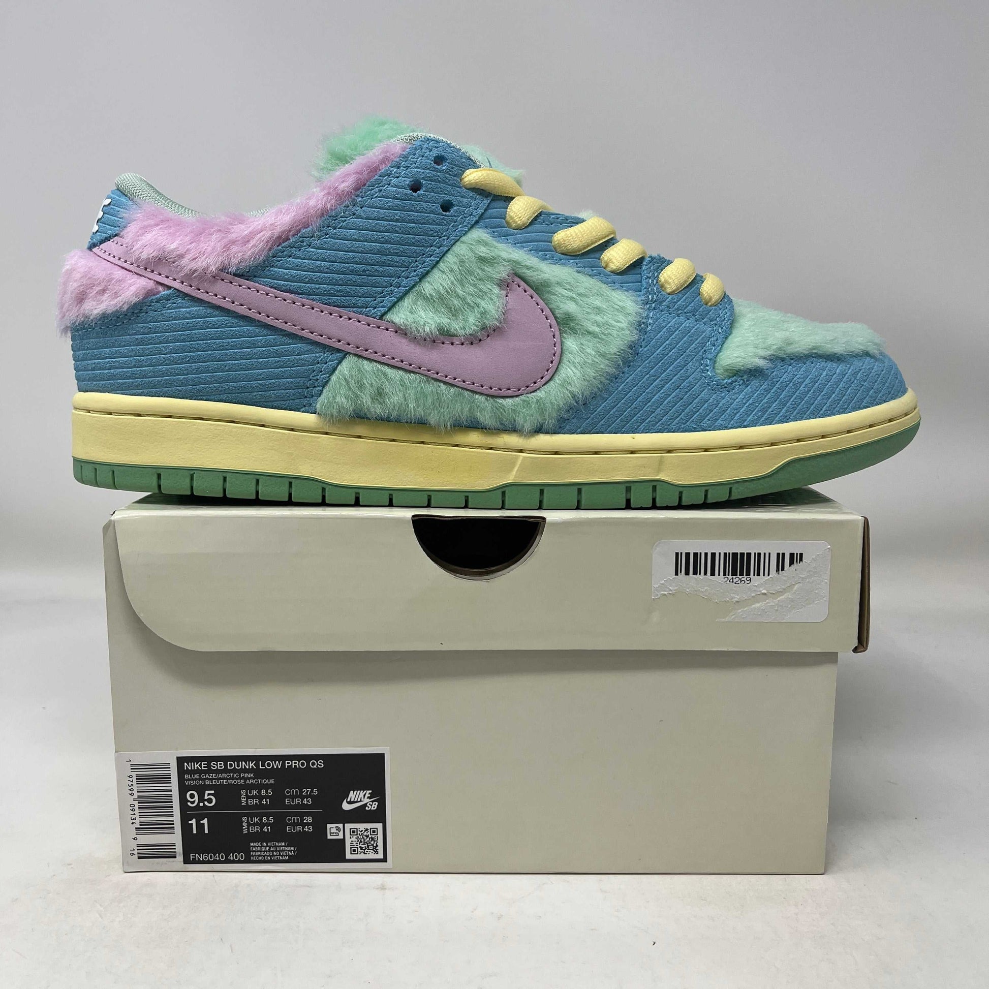 Nike SB Dunk Low Verdy Visty sneaker with pastel blue, green, pink, and yellow fuzzy accents on box